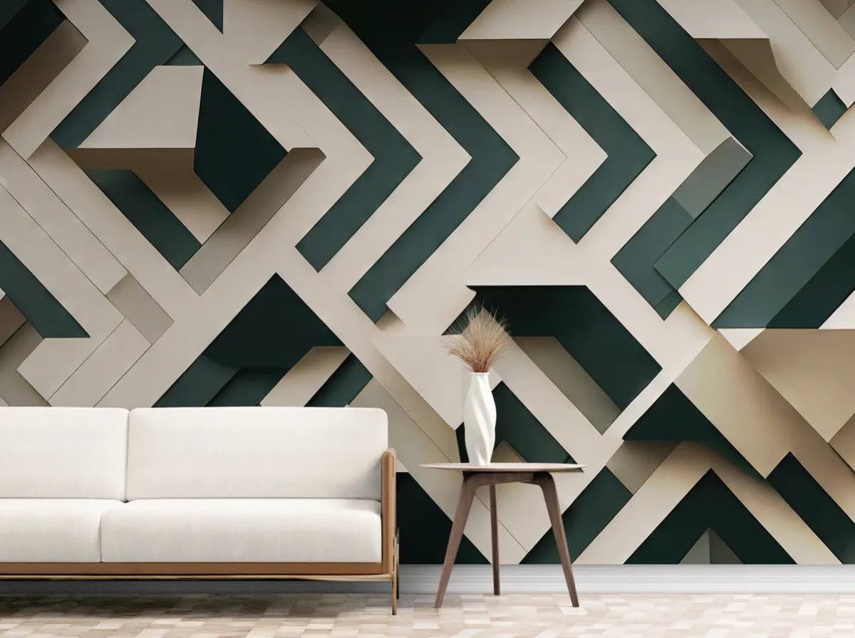 Salon minimaliste avec papier peint 3D géométrique vert et beige posé sur une cloison en placo