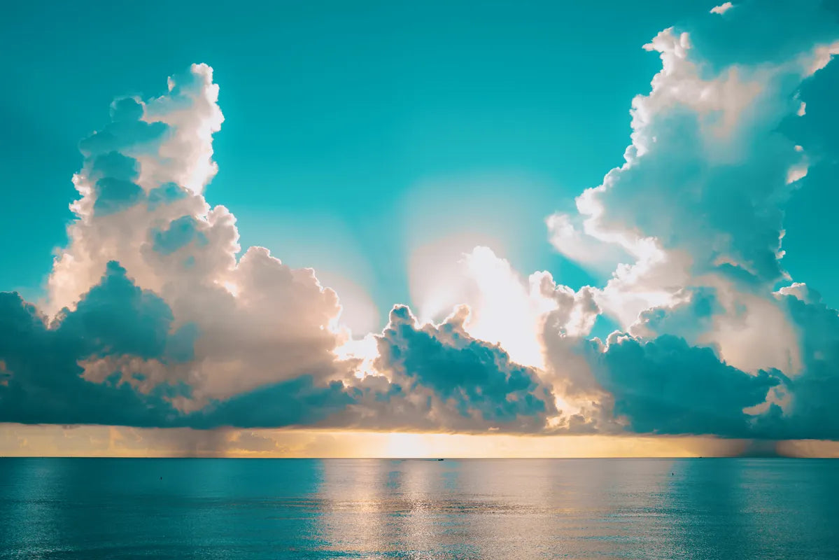 Papier peint panoramique océan et nuages