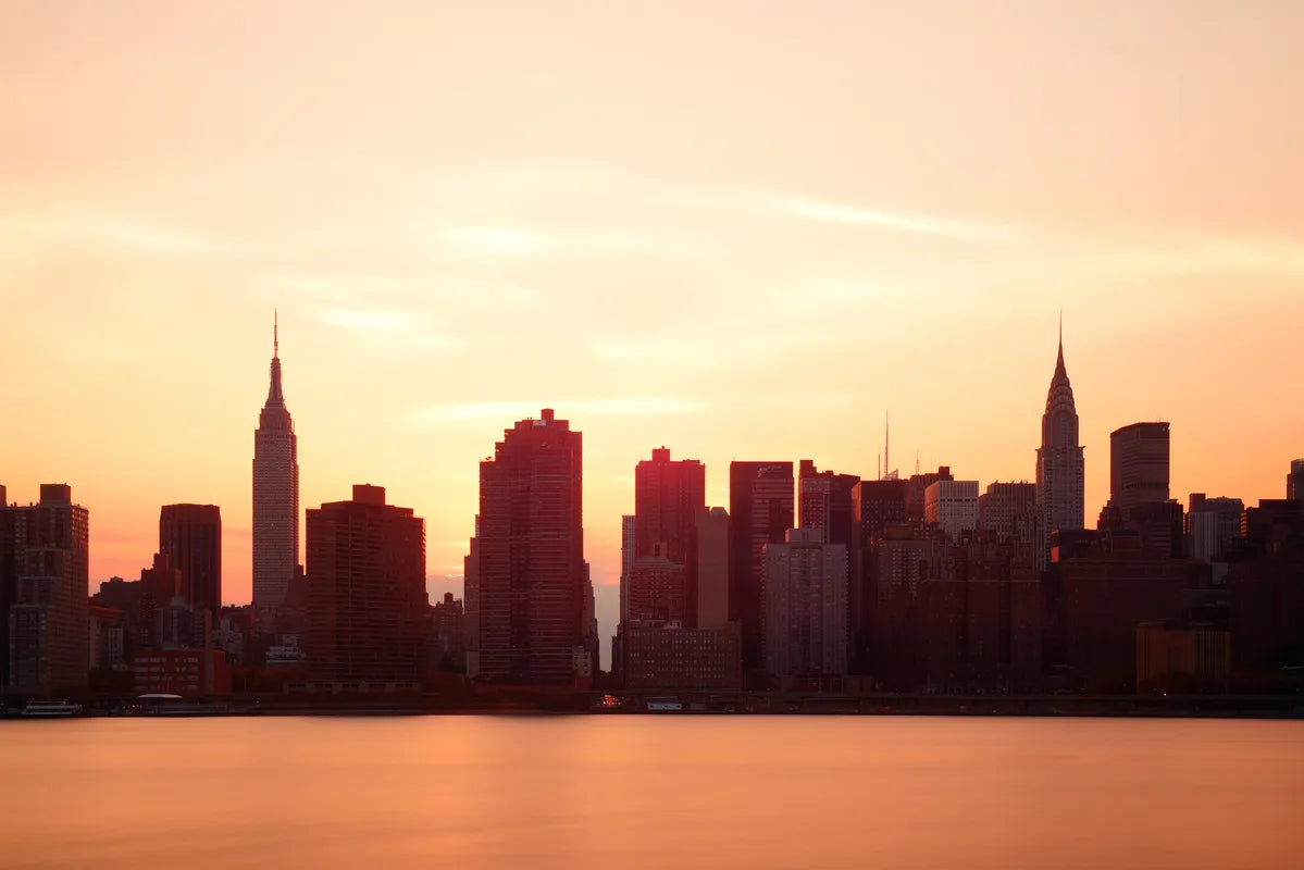 Papier‎ peint‎ panoramique‎ coucher‎ de‎ soleil‎ sur‎ les‎ buildings