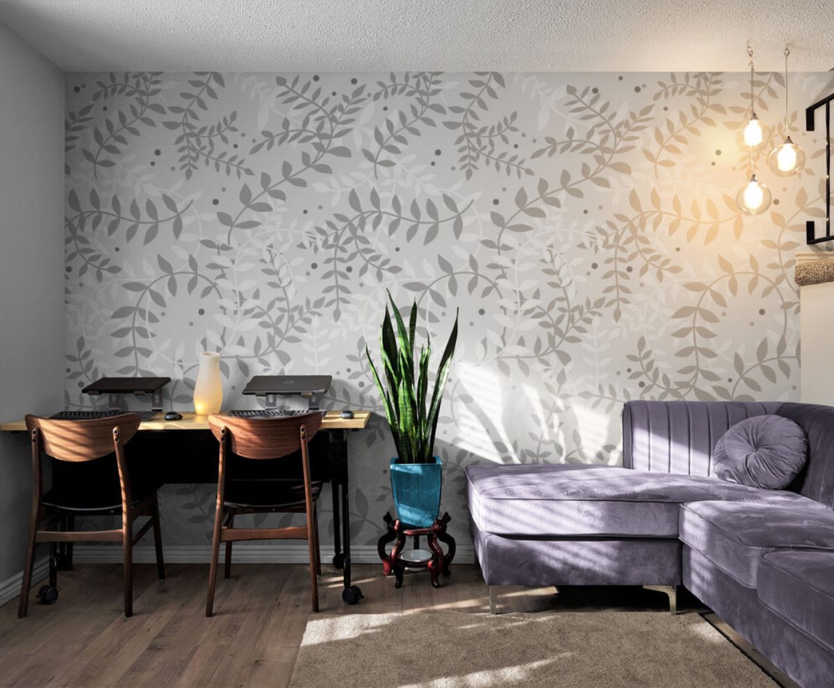 Papier peint motif feuillage gris et blanc mur salon