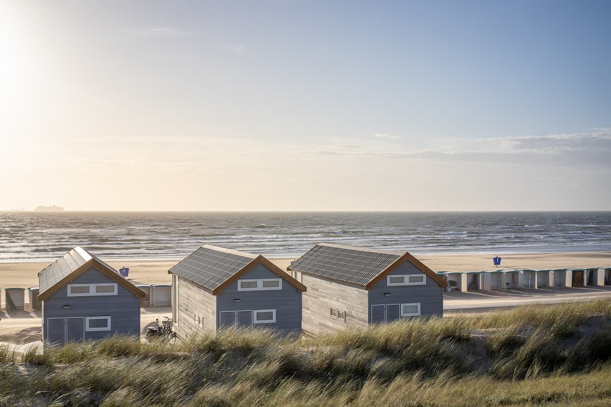 Papier peint panoramique maison vue bord de plage